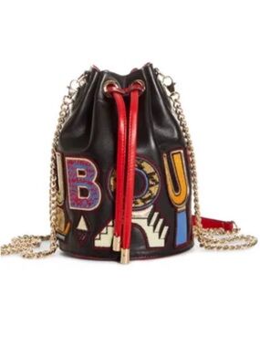 Very Rare Christian Louboutin bucket bag with his signature at the bottom.